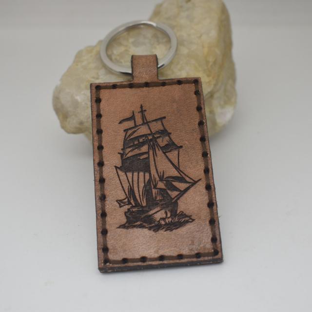 Id rather go through the storm with Jesus than to sail through life without him leather sailboat keychain.jpg